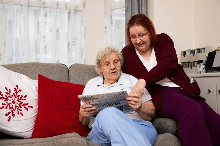Home-Based Car Help, reading a newspaper